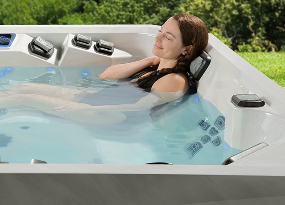someone enjoying a Marquis hot tub