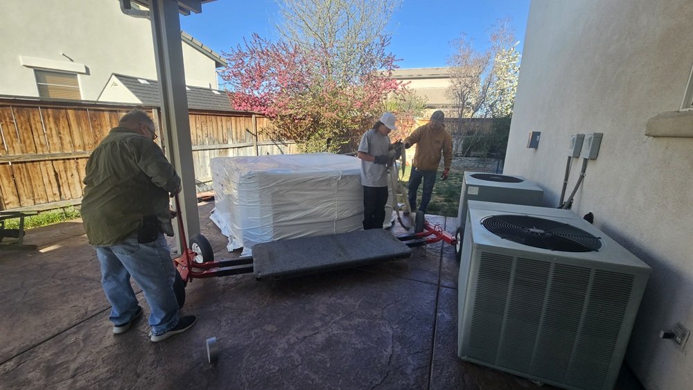 Sun Leisure Pools & Spas getting a Marquis Spa delivered and installed for someone.